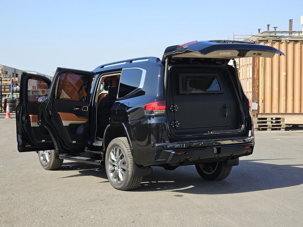 2025 Toyota Land Cruiser 300 VXR rear cargo area with custom security panel and viewing window