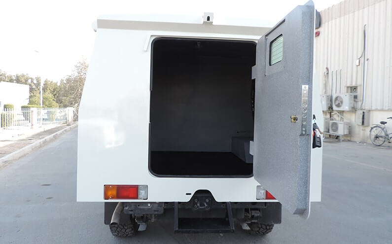 Armored Toyota Land Cruiser rear door open exterior view