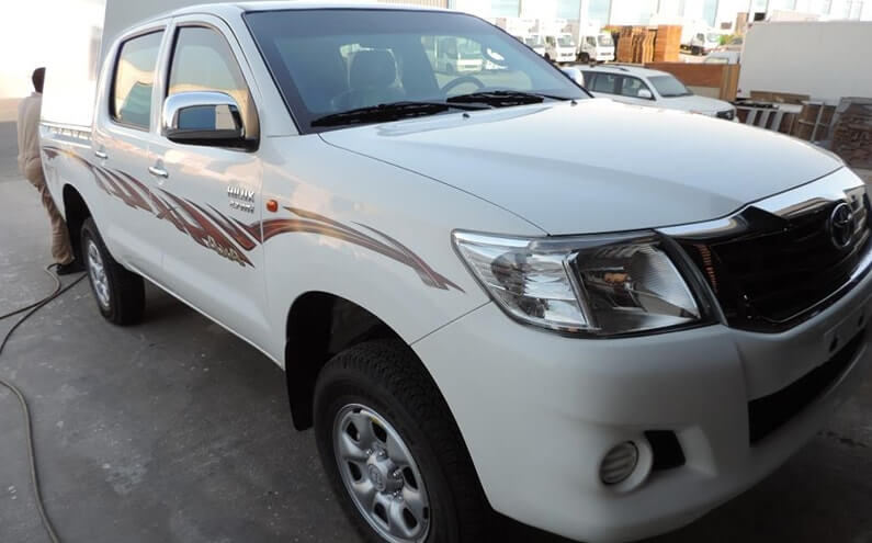 Armored Toyota Land Cruiser exterior side profile view