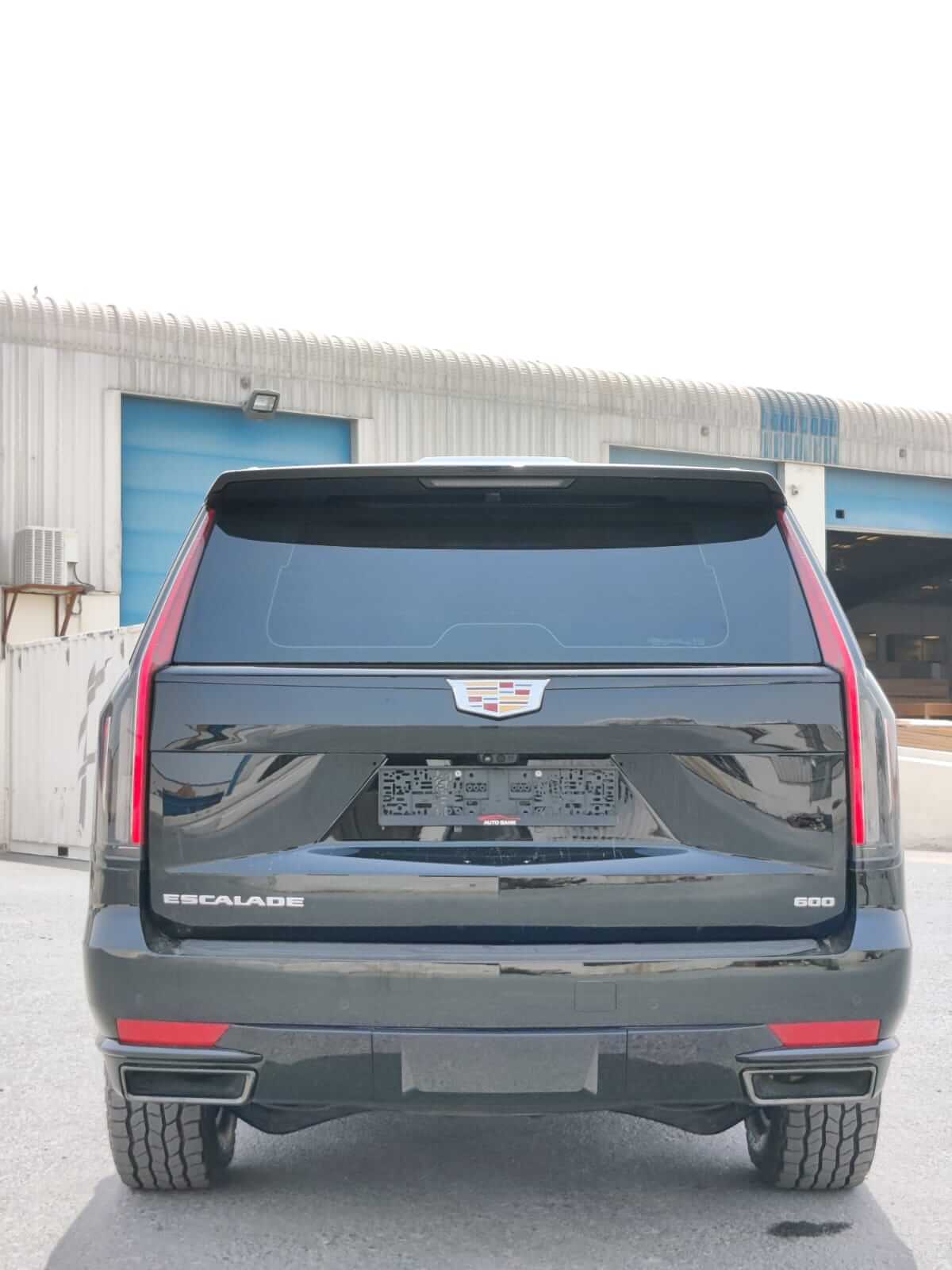 Cadillac Escalade armored luxury SUV rear exterior view