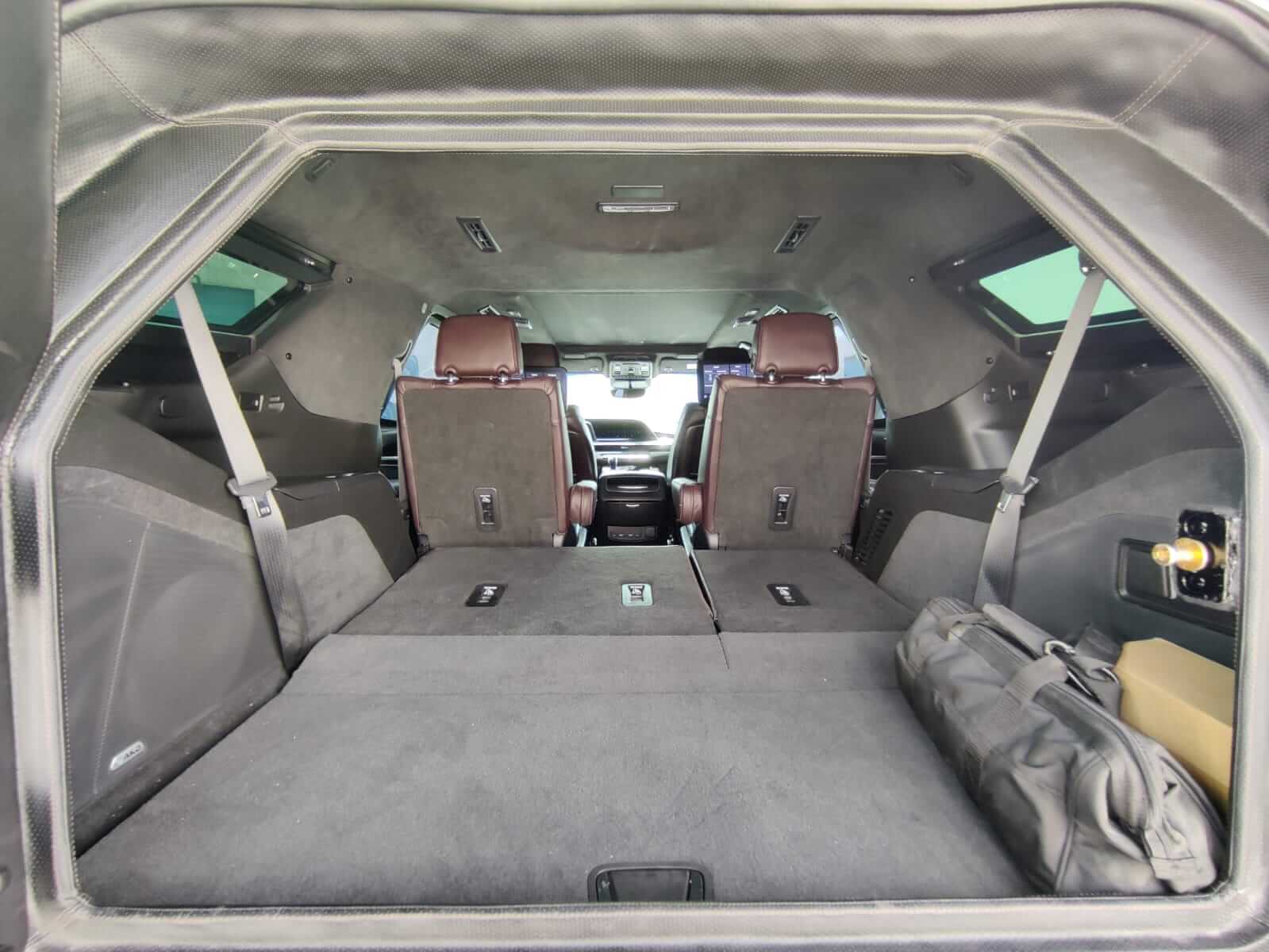 Cadillac Escalade armored luxury SUV interior spacing view