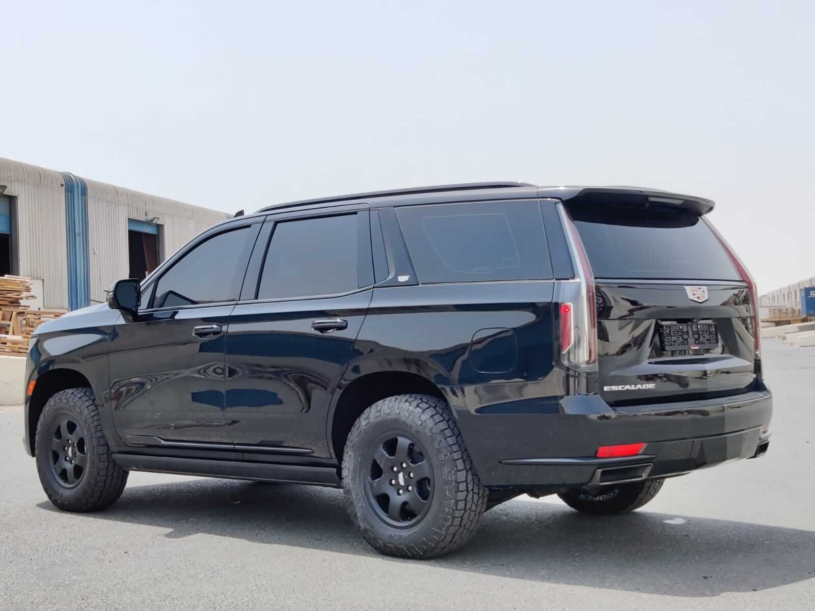 Cadillac Escalade armored luxury SUV right side exterior view