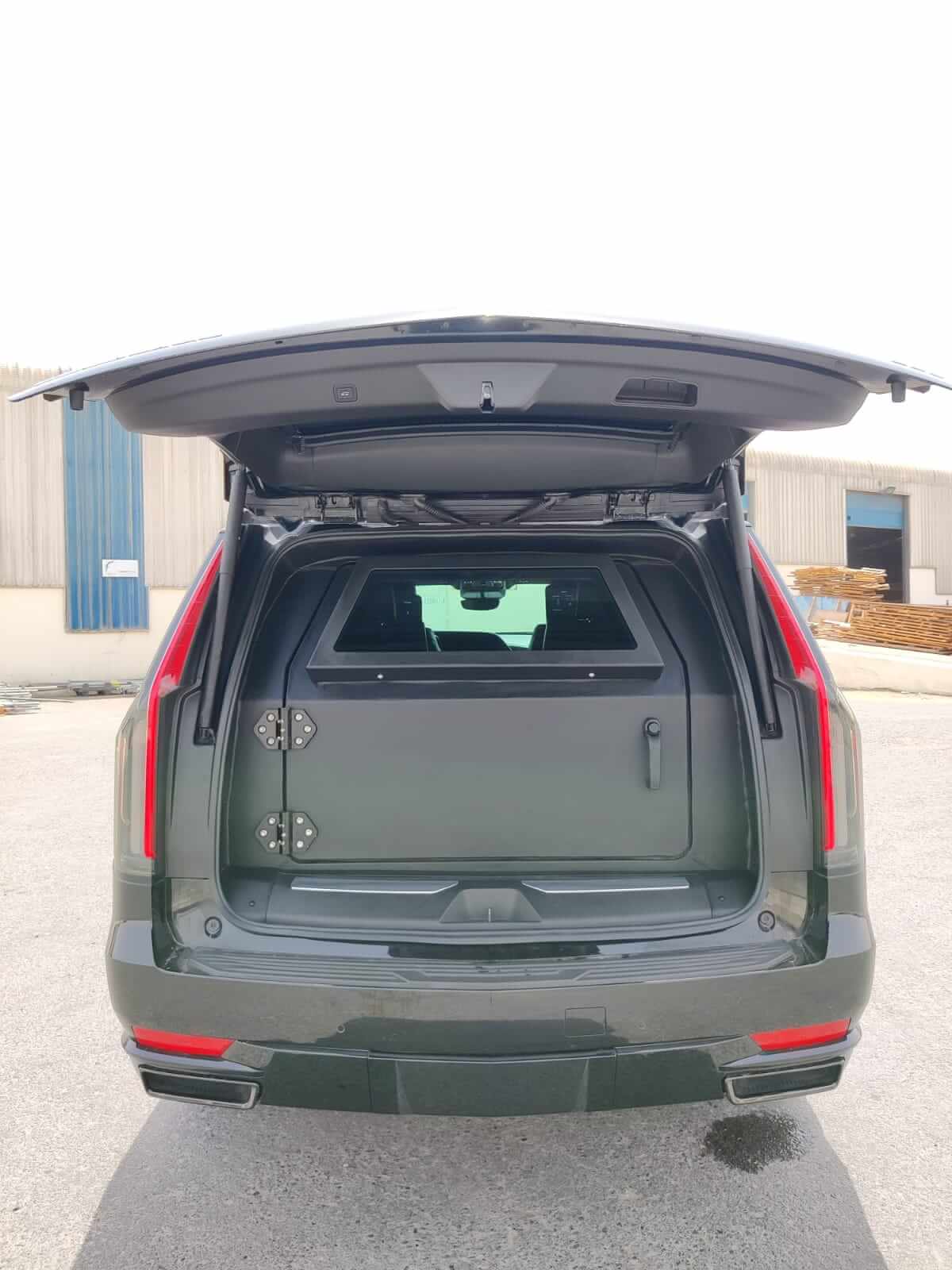 Cadillac Escalade armored luxury SUV trunk open armoring detail