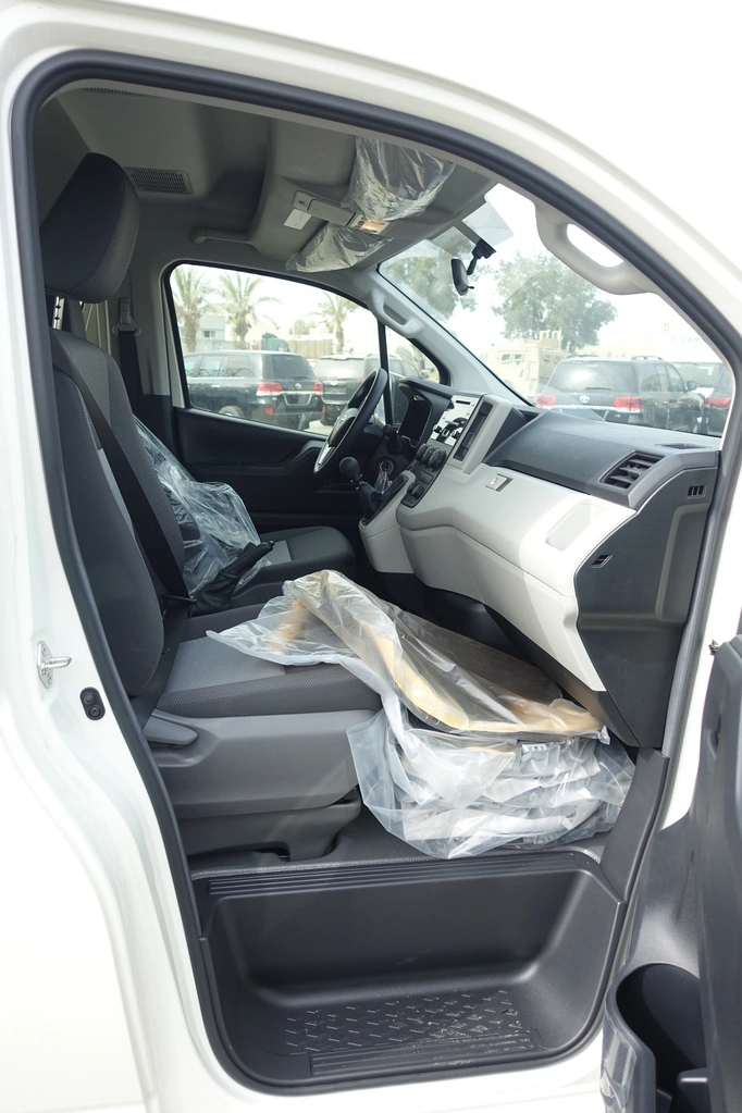 Toyota HiAce 3.5L side access view with sliding door and white exterior