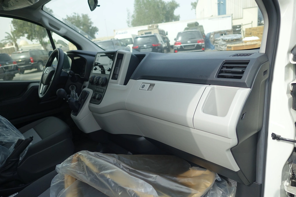 Toyota HiAce 3.5L rear view showing cargo door and passenger carrier profile