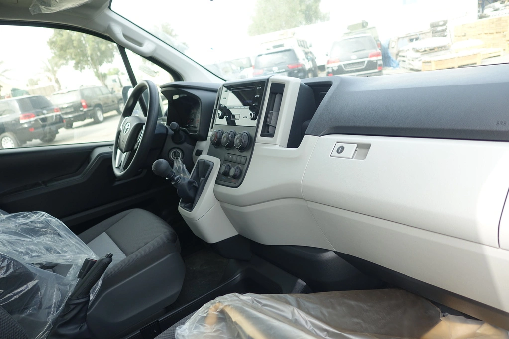Toyota HiAce 3.5L front quarter view with armored passenger carrier stance