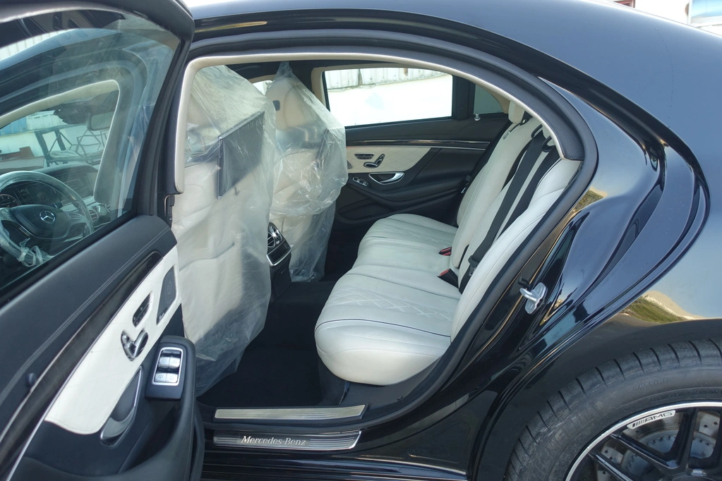 Mercedes-Benz S550 rear three-quarter view with black exterior finish
