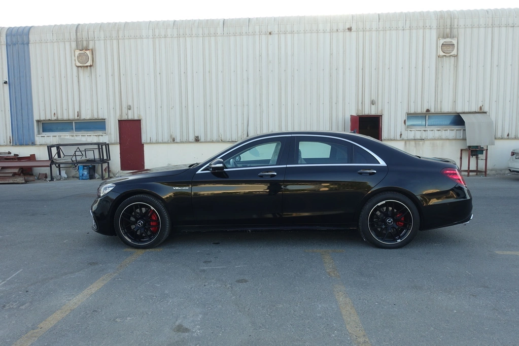 Mercedes-Benz S550 rear exterior detail with tail lights and black finish