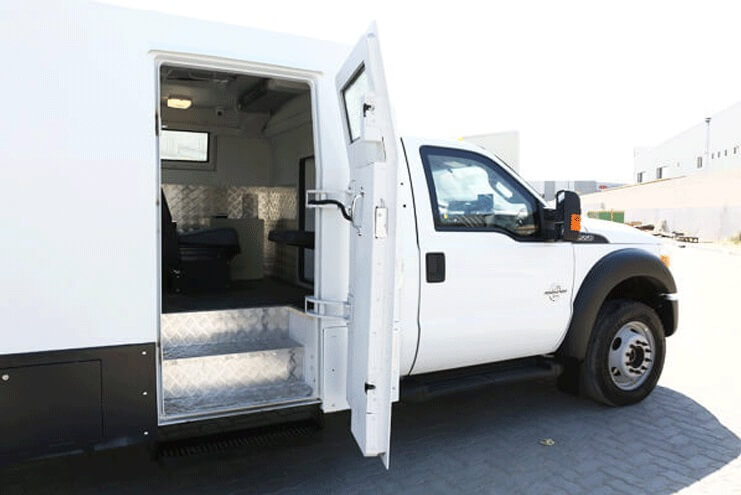 Ford F550 armored cash-in-transit vehicle side door open view