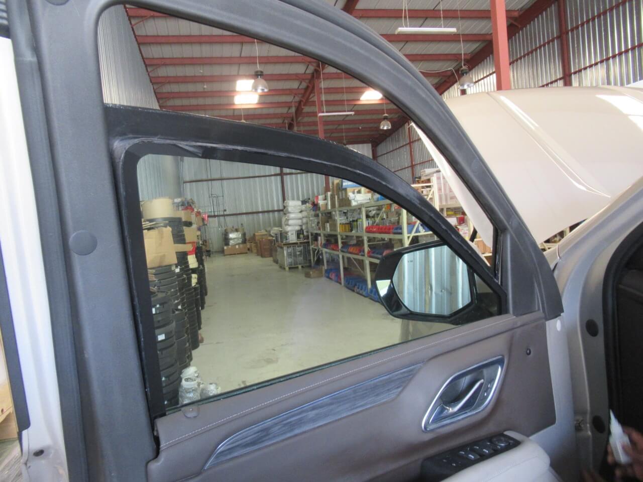 GMC Yukon driver seat window armoring detail