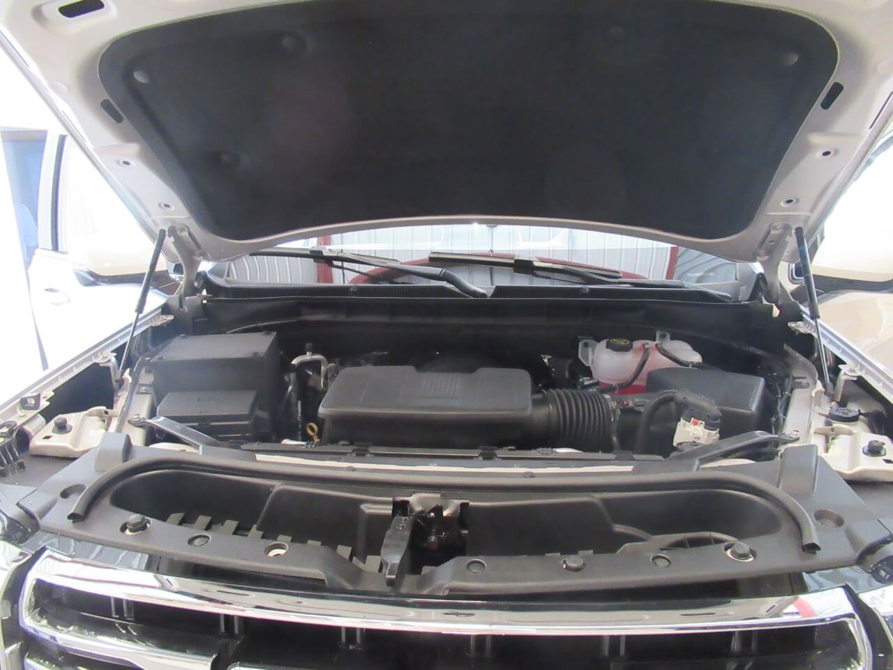 GMC Yukon engine view under open hood