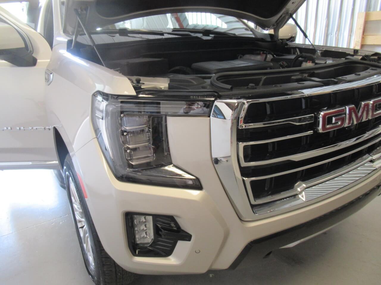 GMC Yukon front grille and lights exterior detail