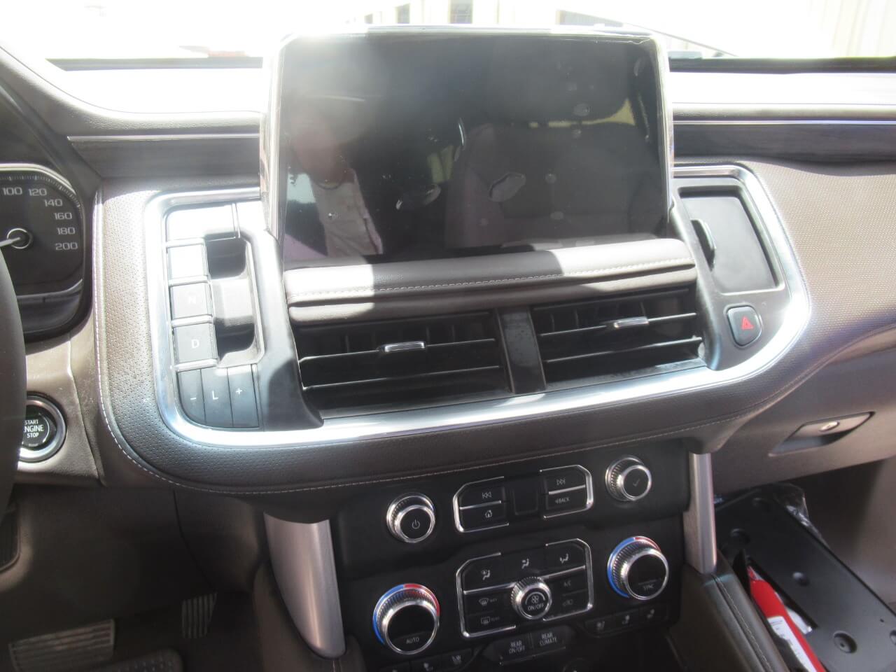 GMC Yukon dashboard screen inside armored SUV