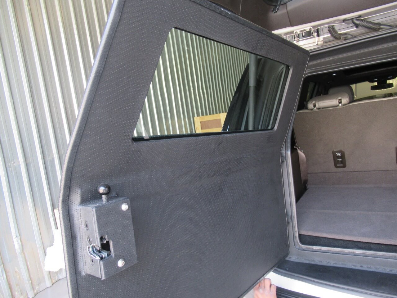 GMC Yukon trunk armoring detail for protected cargo area