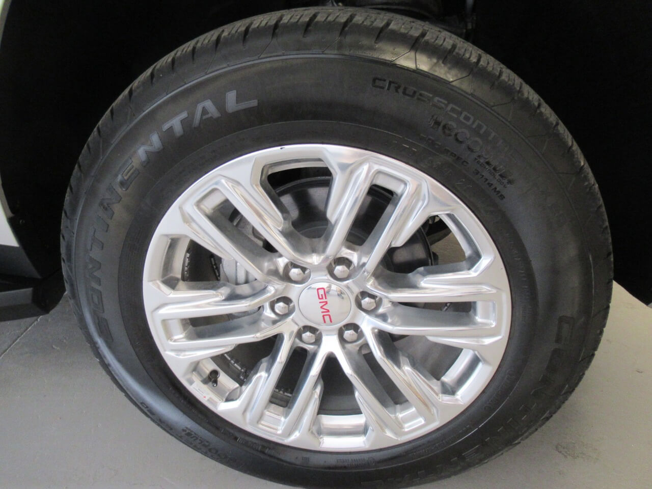 GMC Yukon wheel and rim detail on armored luxury SUV