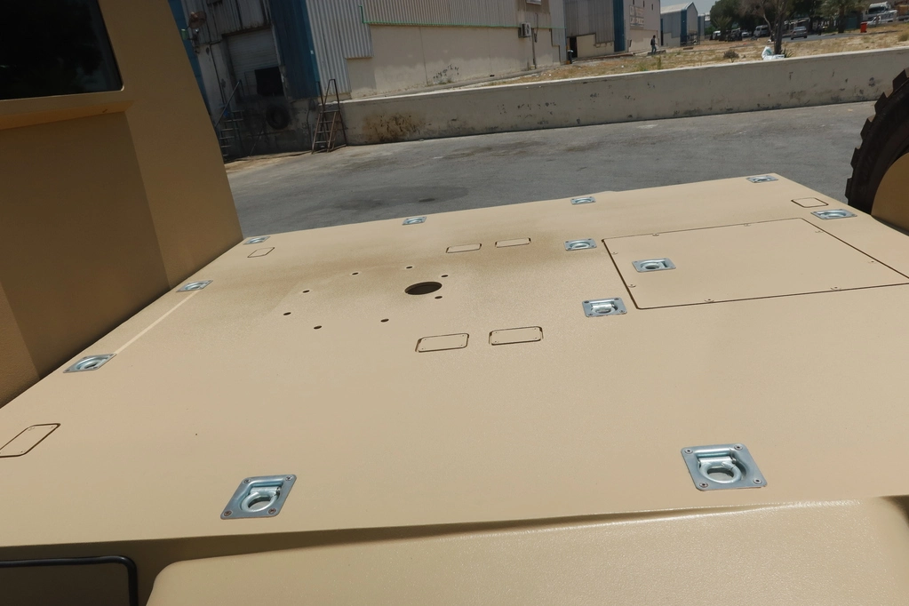 Ford F350 Diesel APC rear cabin access detail with secure armored compartment