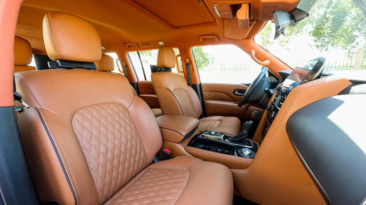 Infiniti QX80 4WD Extended armored luxury SUV cockpit interior view