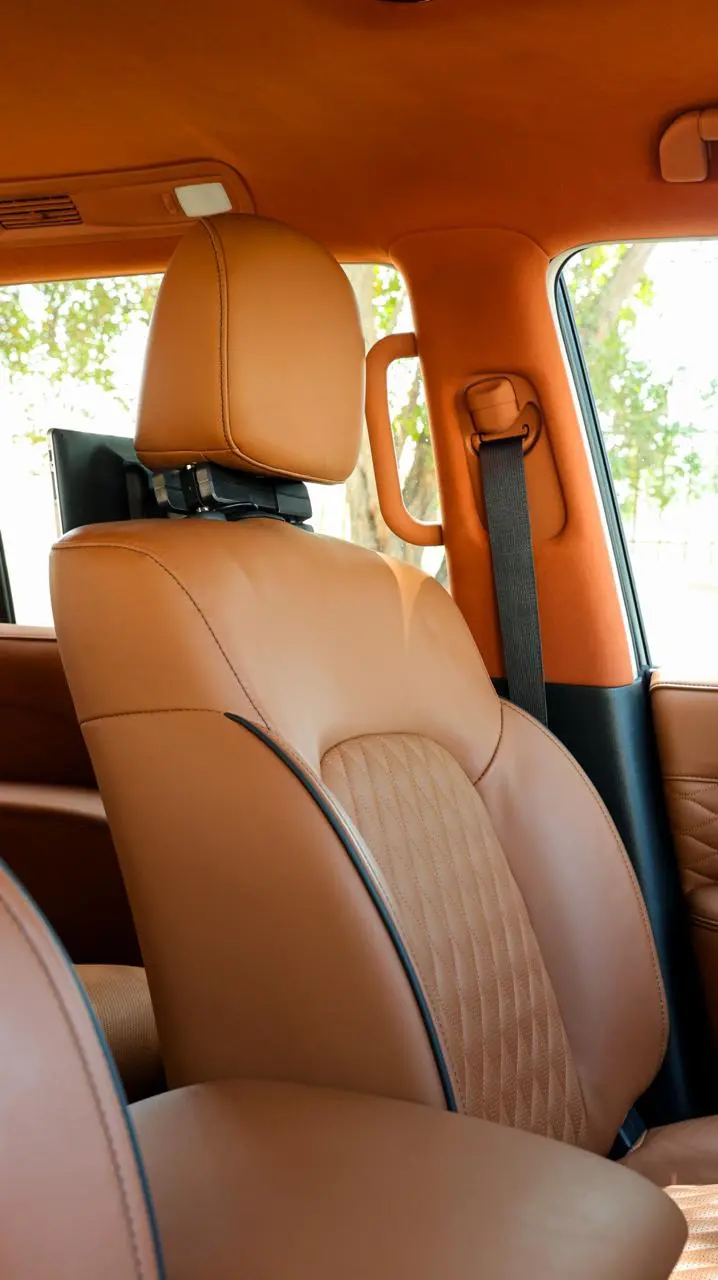 Infiniti QX80 4WD Extended armored luxury SUV driver seat detail