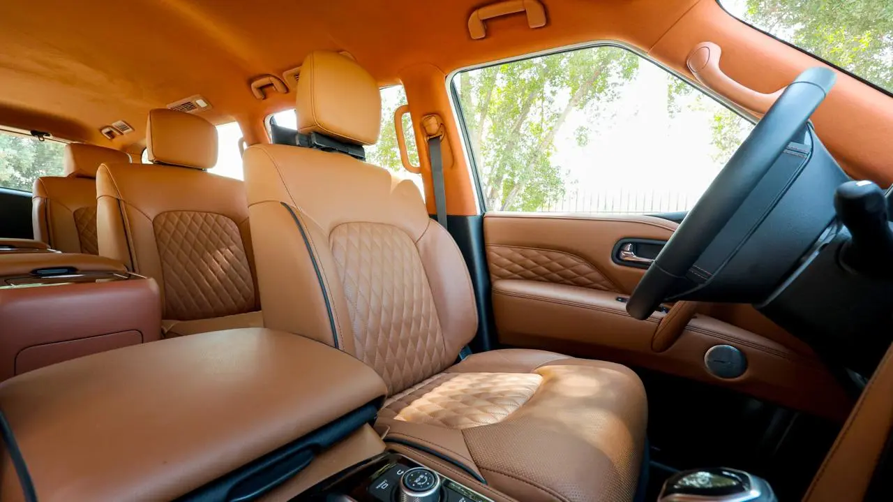 Infiniti QX80 4WD Extended armored luxury SUV driver seat view