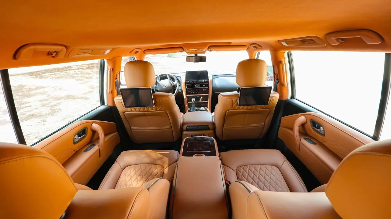 Infiniti QX80 4WD Extended armored luxury SUV interior with screens