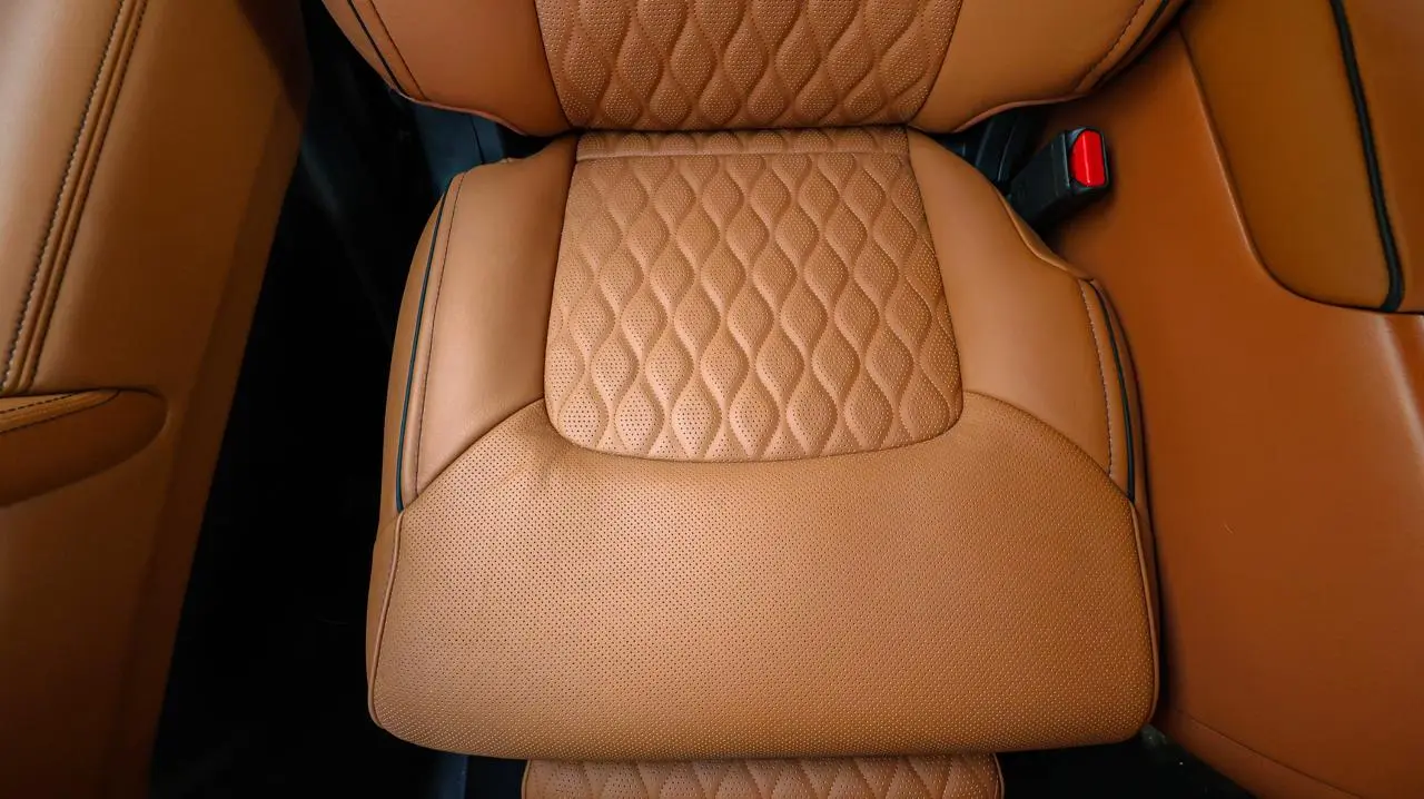 Infiniti QX80 4WD Extended armored luxury SUV passenger seat close detail