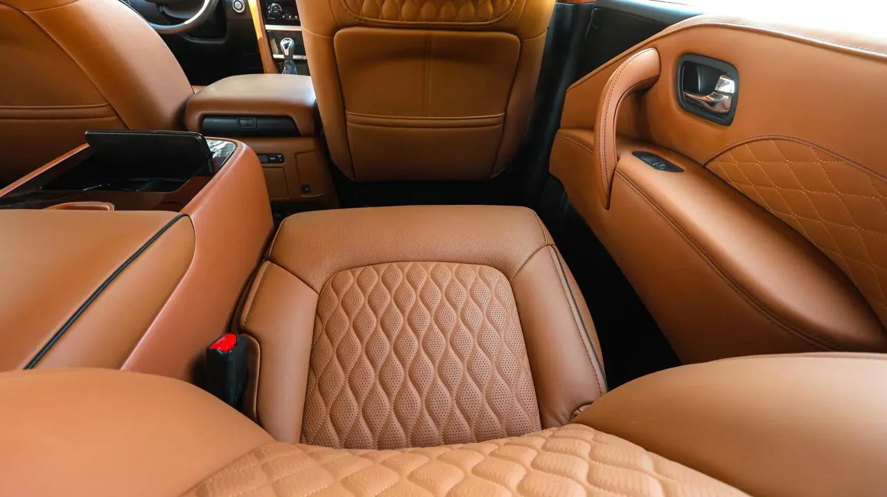 Infiniti QX80 4WD Extended armored luxury SUV passenger seat detail