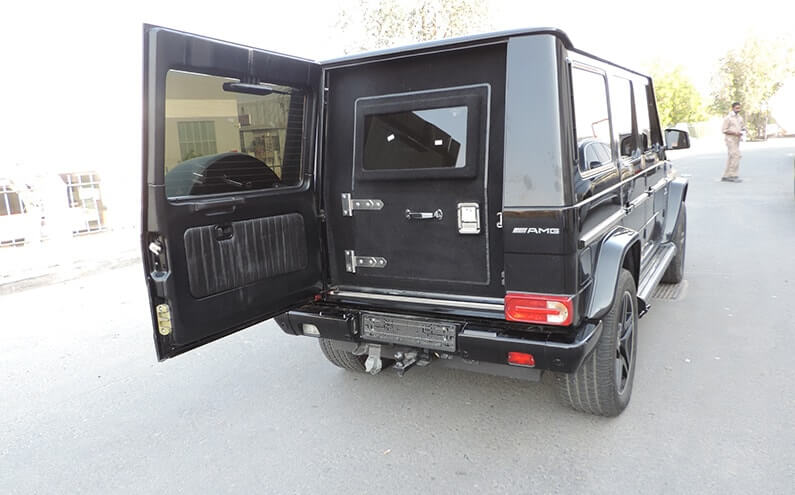 Mercedes-Benz AMG G55 Black armored SUV trunk open view