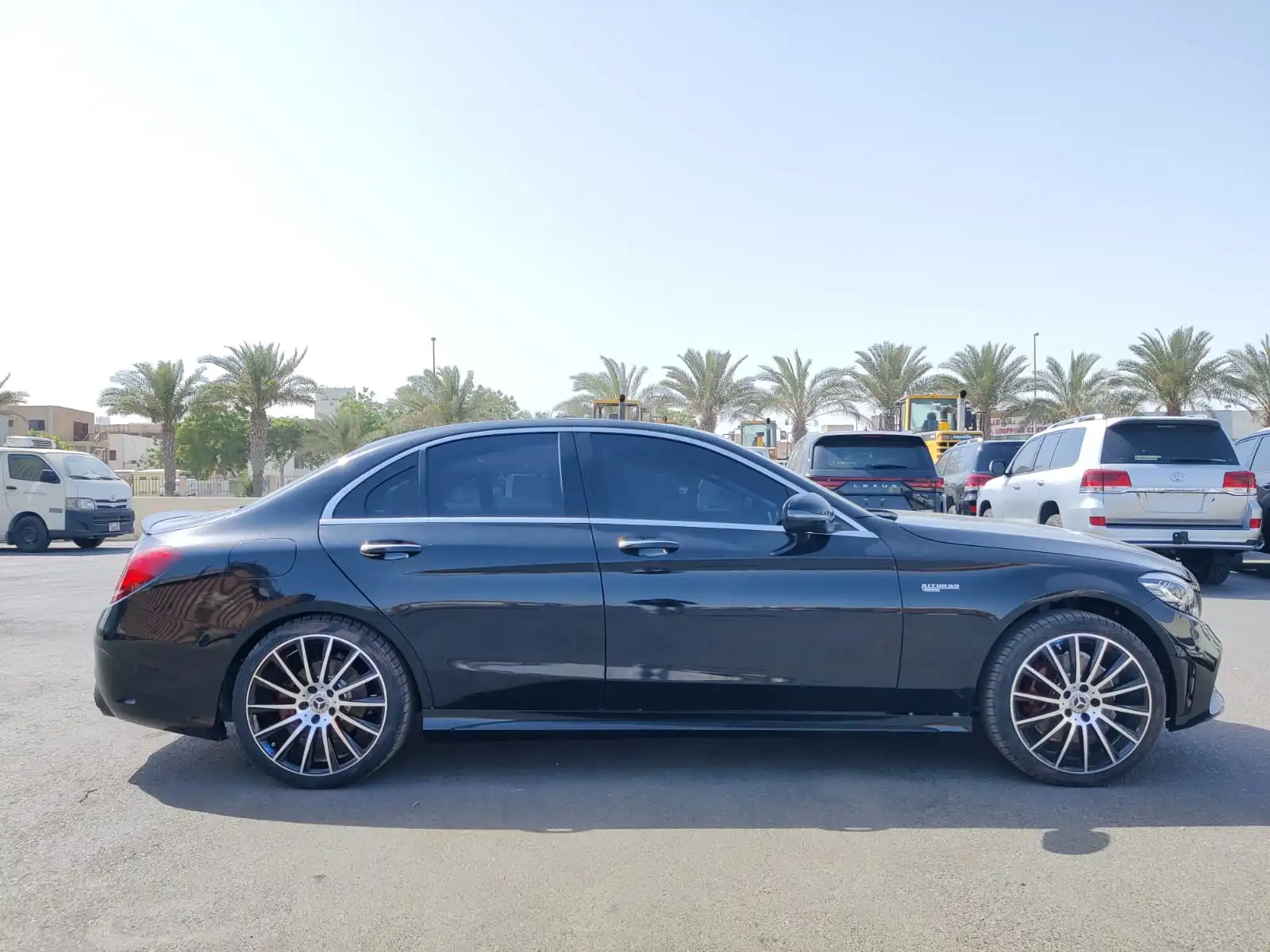 Armored Mercedes-Benz C300 black sedan side view with discreet B6 protection