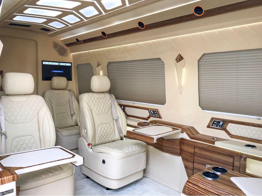 Side view of seats inside the SchutzCarr Mercedes-Benz VIP BR6 Sprinter