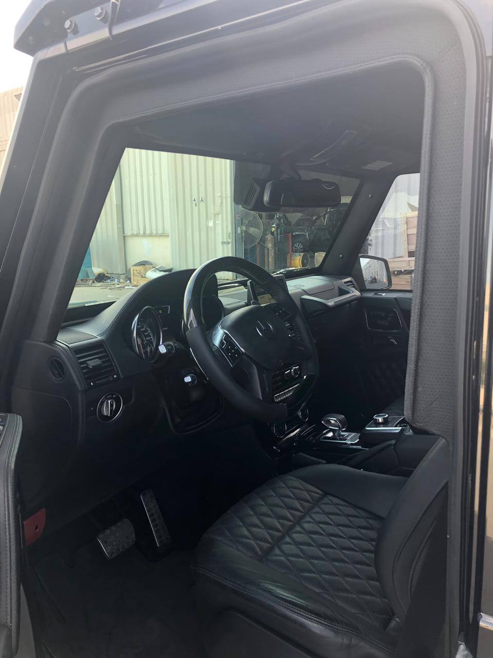 Mercedes-Benz G63 Brabus Black armored SUV driver seat view