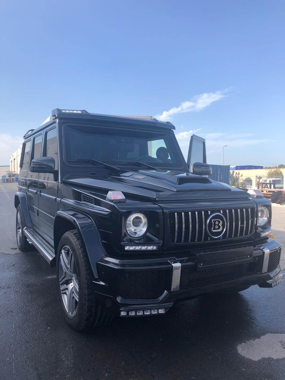 Mercedes-Benz G63 Brabus Black armored SUV driver door open view