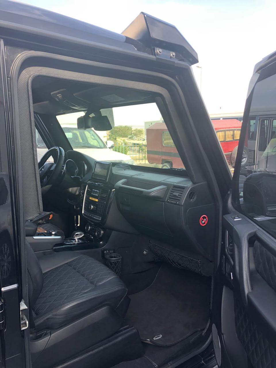 Mercedes-Benz G63 Brabus Black armored SUV passenger seat front view