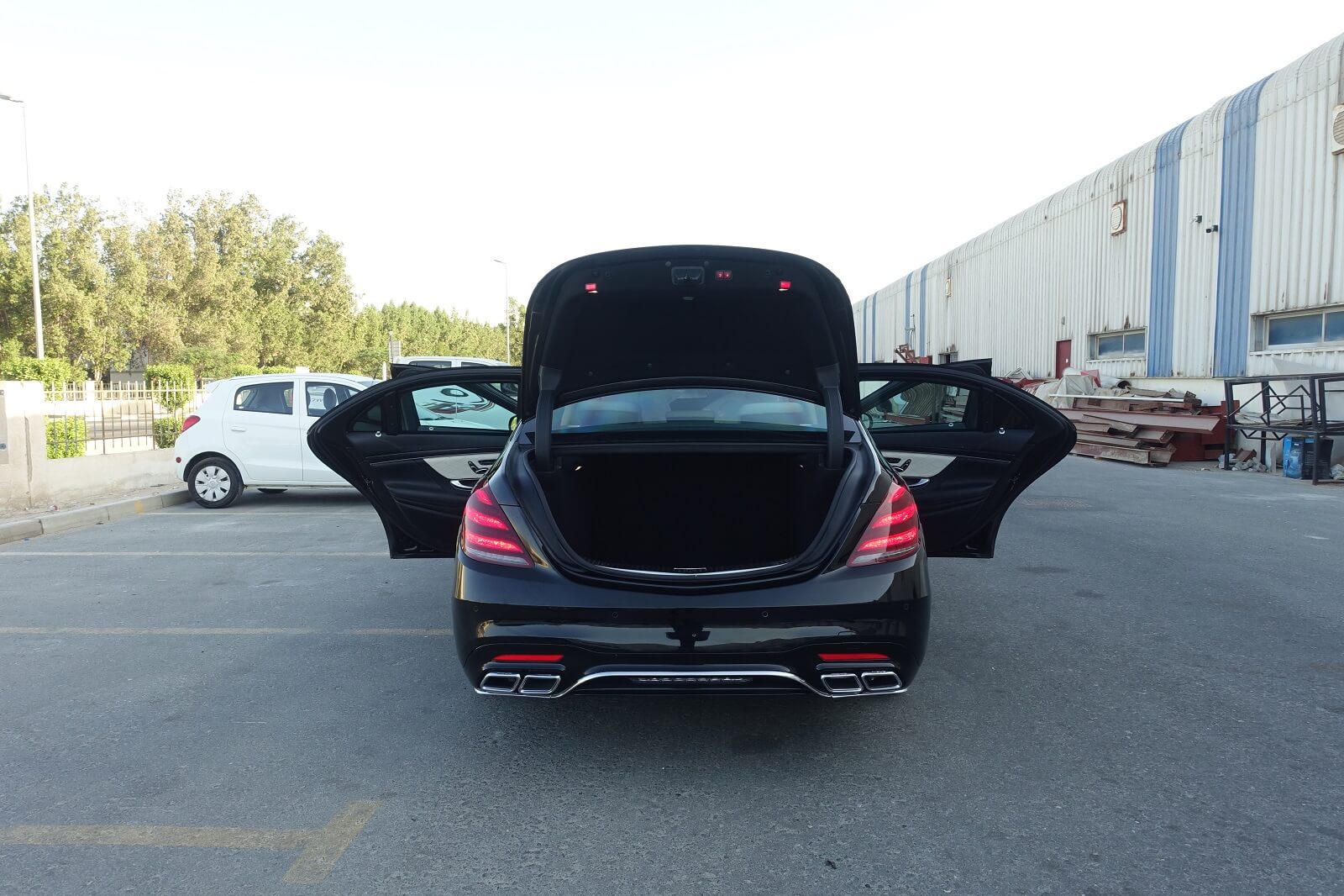 Mercedes-Benz S-Class armored luxury sedan rear view with all doors open