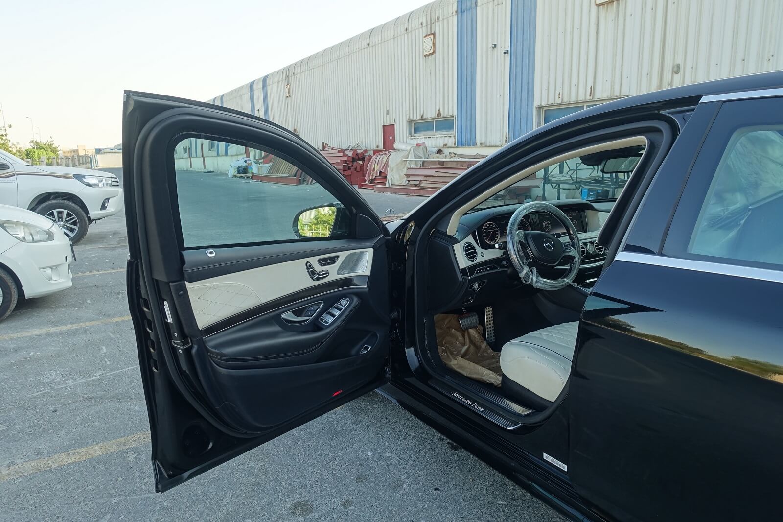 Mercedes-Benz S-Class armored luxury sedan driver door open view