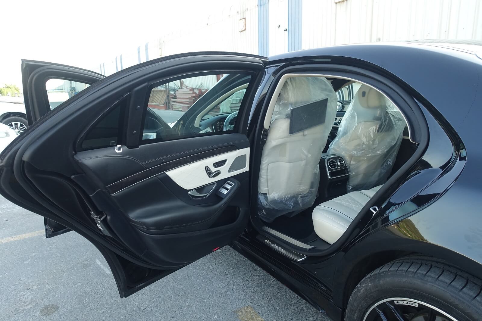 Mercedes-Benz S-Class armored luxury sedan left side doors open view