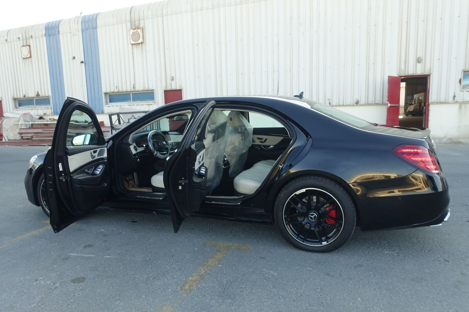 Mercedes-Benz S-Class armored luxury sedan left side with doors open