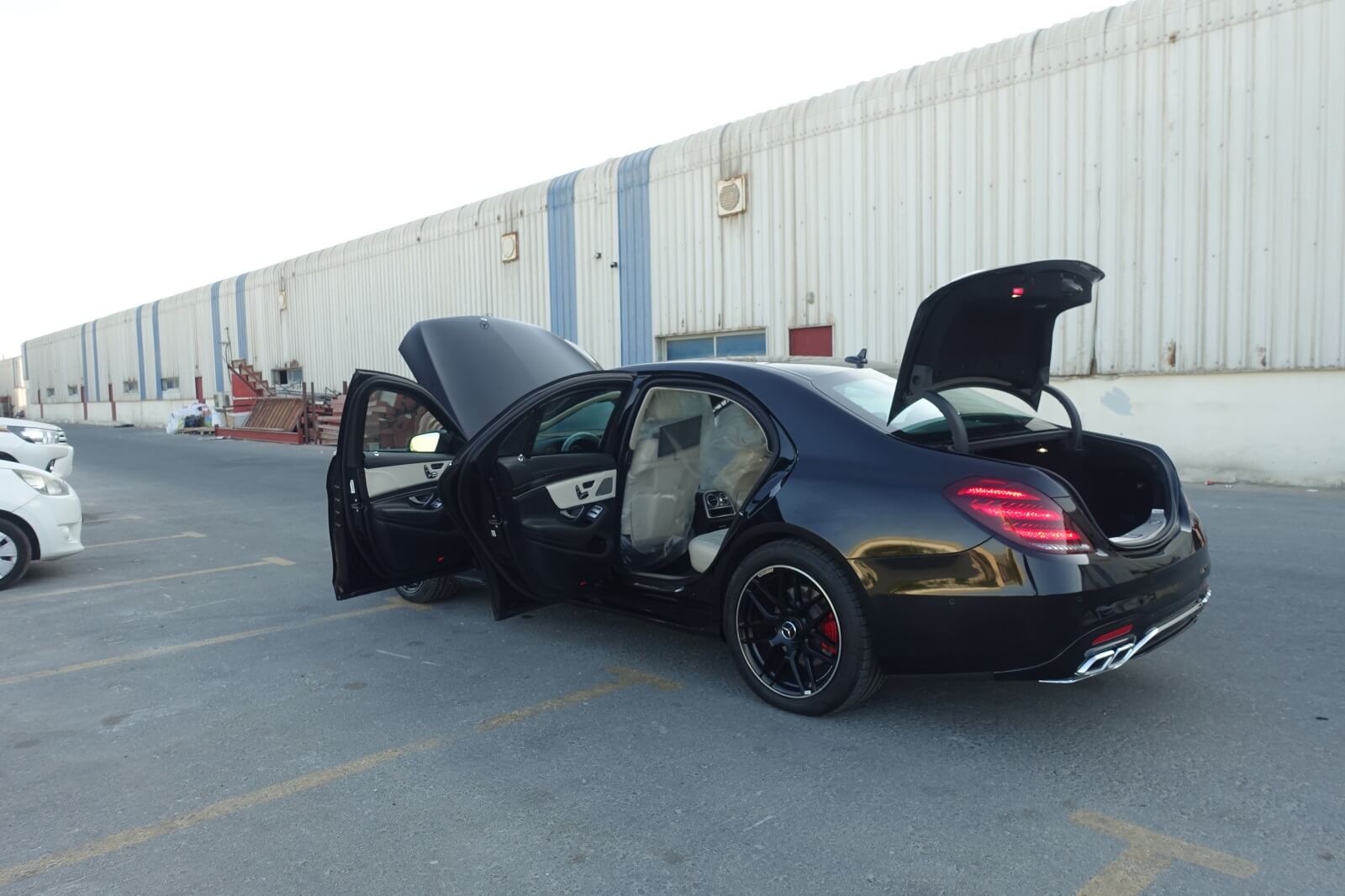 Mercedes-Benz S-Class armored luxury sedan rear left angle with doors open
