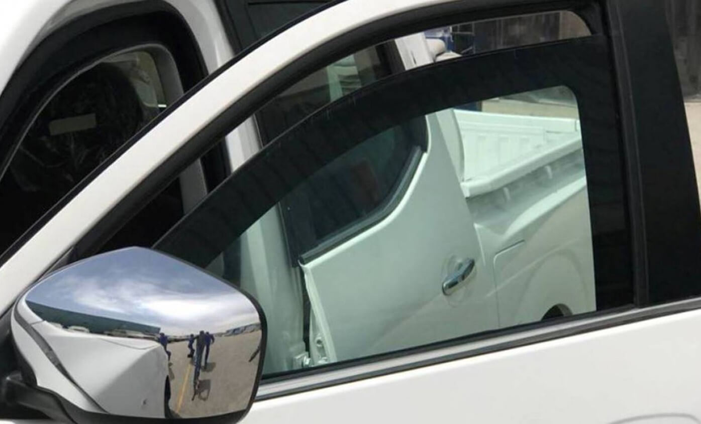 Nissan Navara armored pickup side windows and body detail