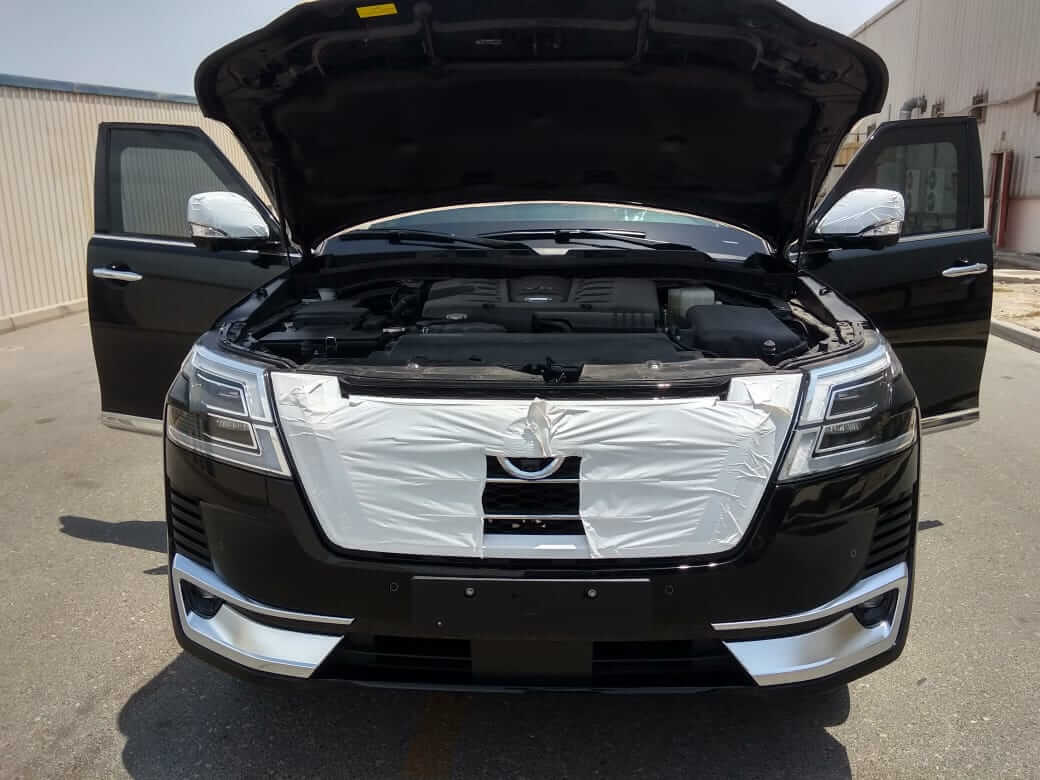 Nissan Patrol armored SUV front view with hood open