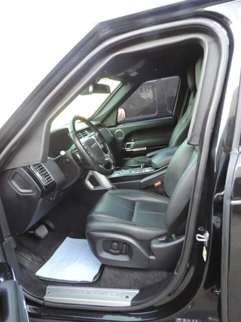 Range Rover Vogue armored luxury SUV cockpit interior view