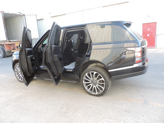 Range Rover Vogue armored luxury SUV left side with doors open