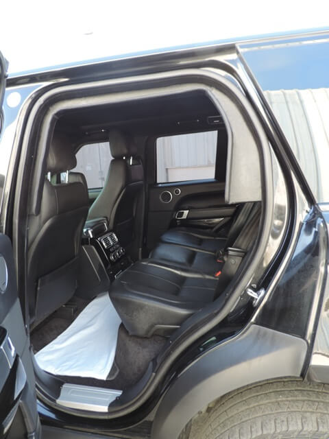 Range Rover Vogue armored luxury SUV passenger door open view