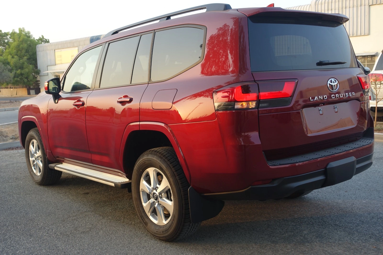 TOYOTA-Land-Cruiser-300-Red-back-view-left-angle