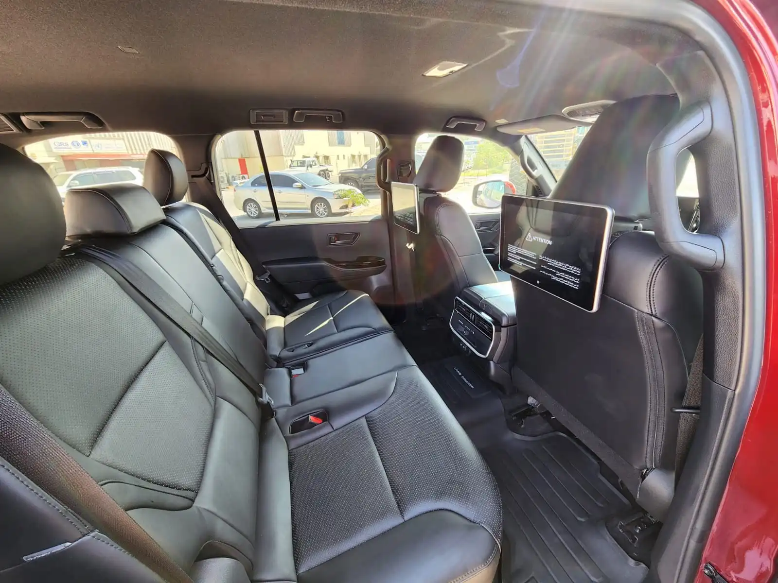 TOYOTA-Land-Cruiser-300-Red-backseat-screens