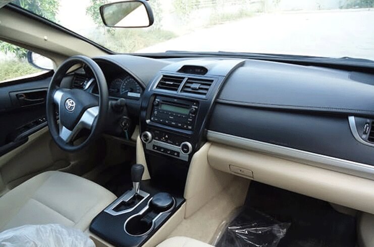 Toyota Camry armored sedan driver cockpit interior view