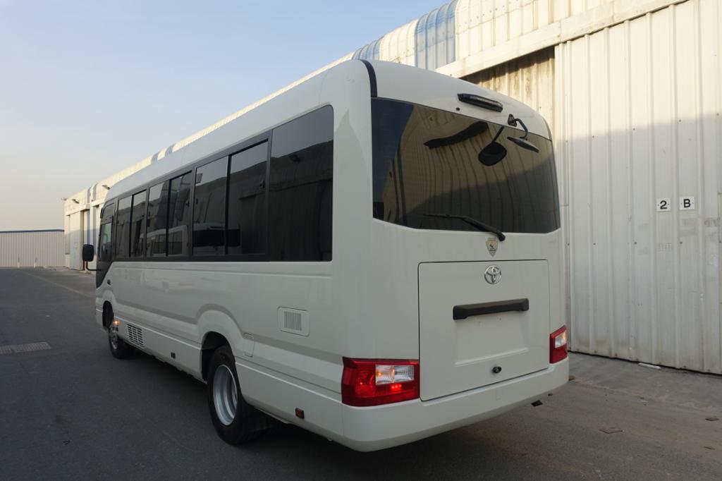 Toyota Coaster Bus BR6 armored passenger carrier rear left exterior angle