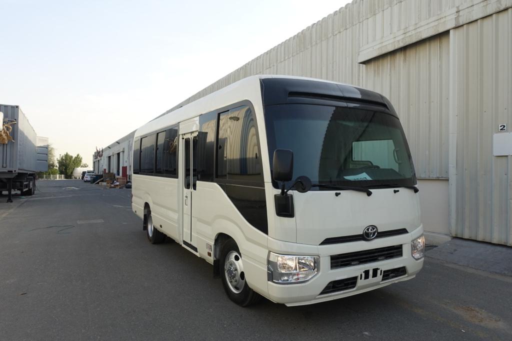 Toyota Coaster Bus BR6 armored passenger carrier front right angle