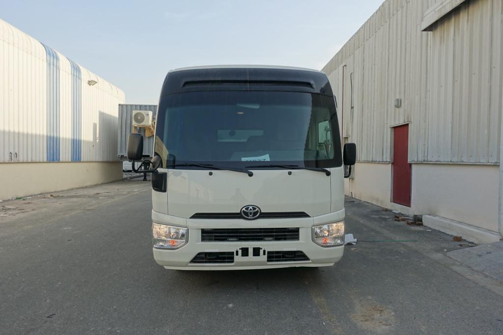 Toyota Coaster Bus BR6 armored passenger carrier front exterior view