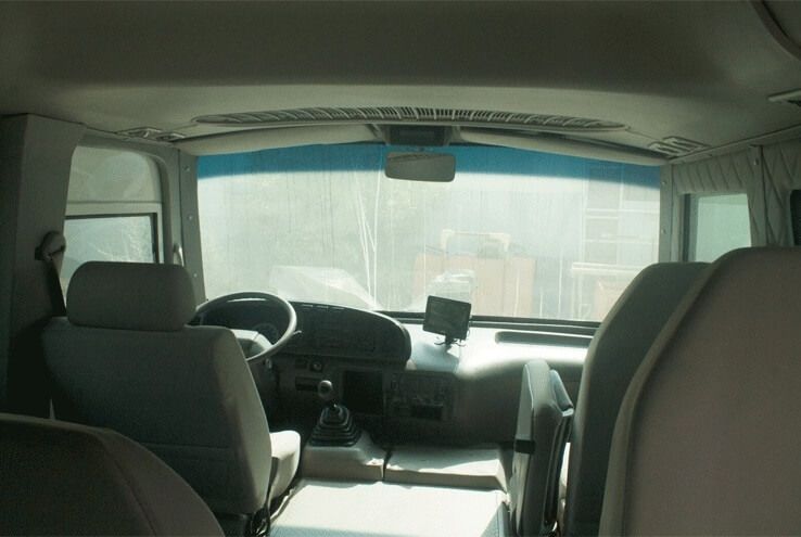Toyota Coaster armored passenger carrier driver cockpit view