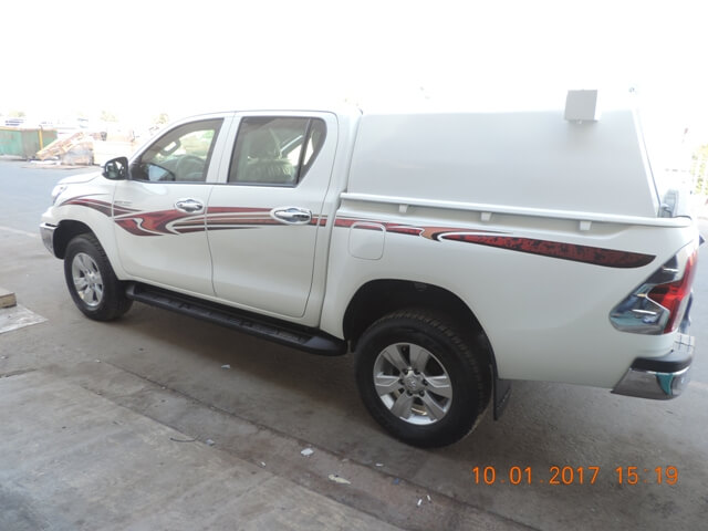 Toyota Hilux cash-in-transit vehicle right side exterior view